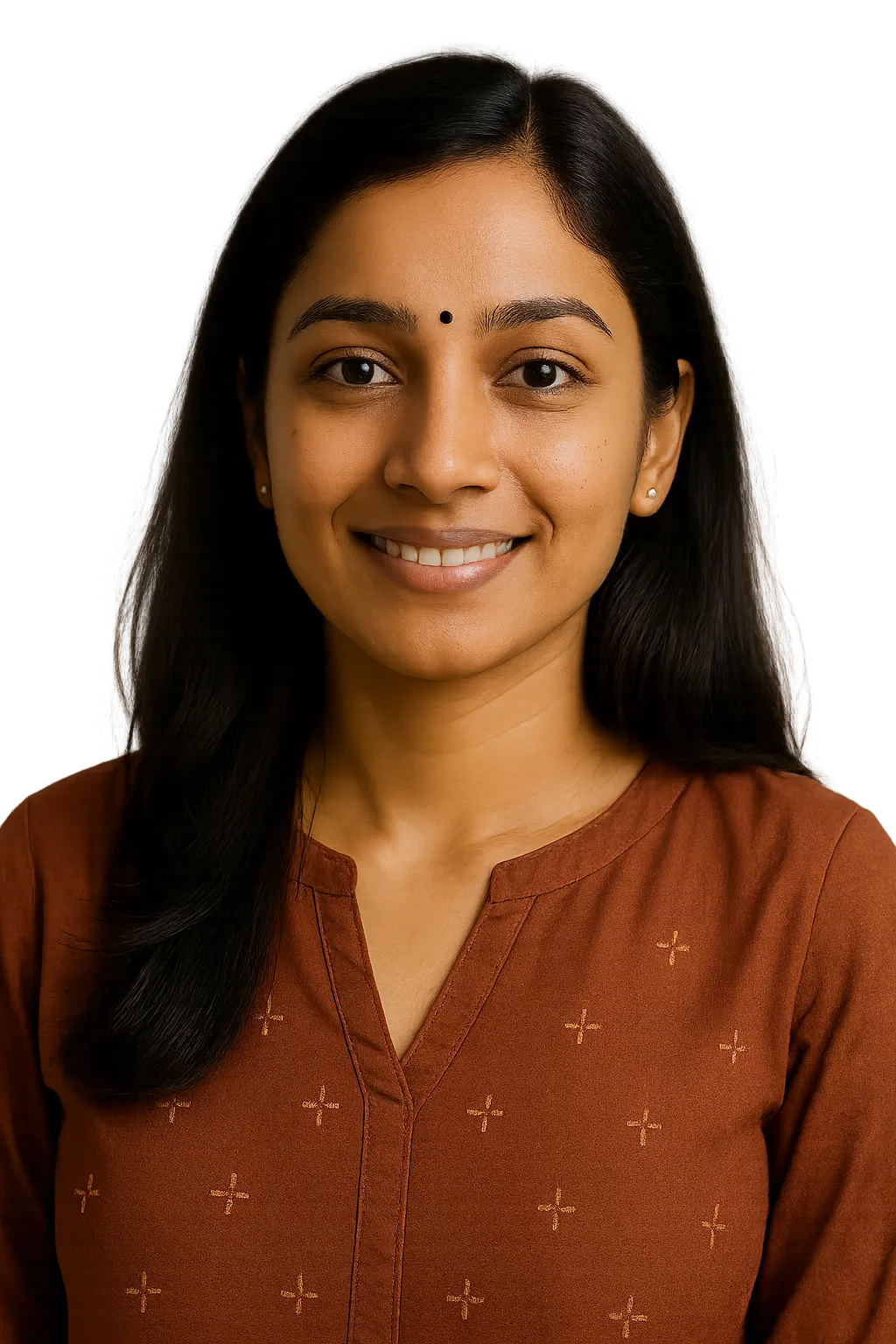 Full-length portrait of a young Indian woman standing confidently in a rust-brown kurta with beige churidar pants and brown flats, isolated on a white background.
