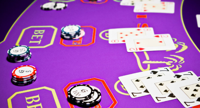 Andar Bahar casino table with betting chips and playing cards illustrating real casino gameplay conditions